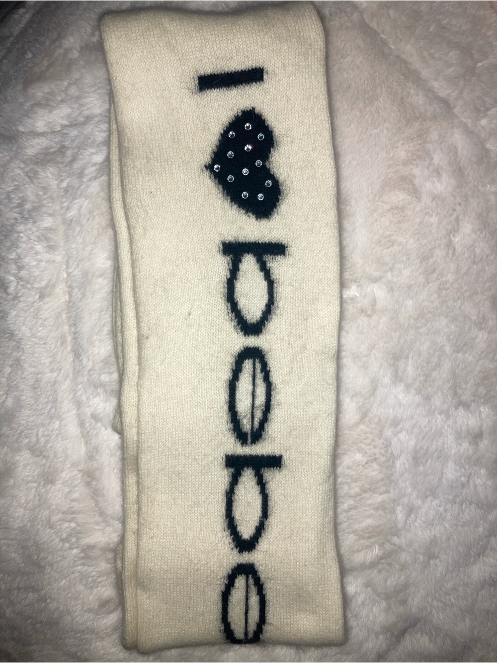Cream Knit Bebe Scarf with Black Heart Accent